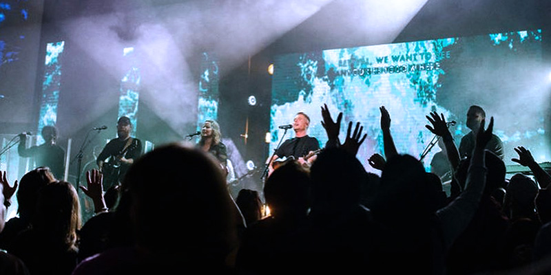 choir performing on life center church stage in front of a church led wall